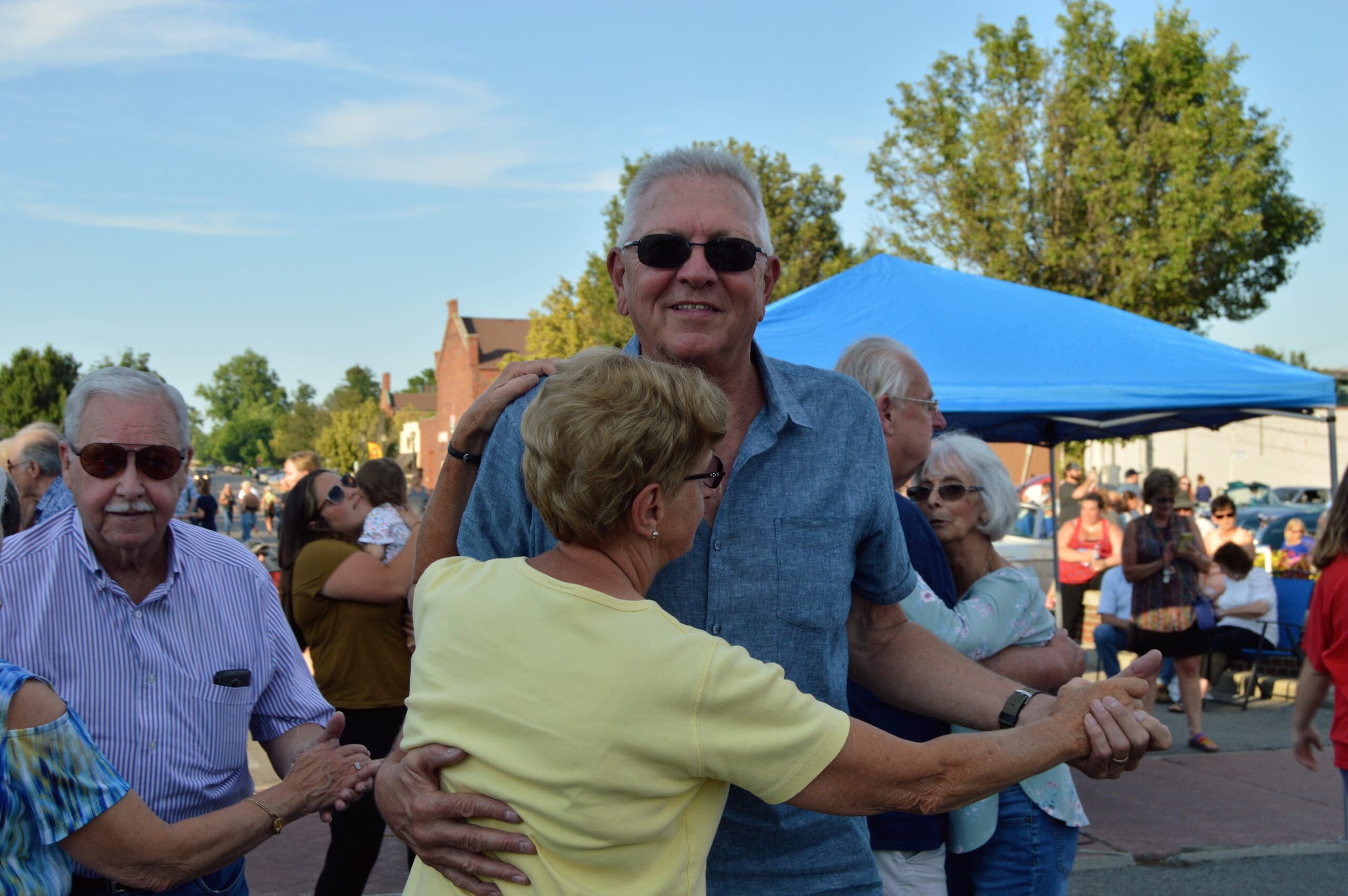 Couple dancing outdoors at Friday Night Live, a summer concert series in downtown La Porte